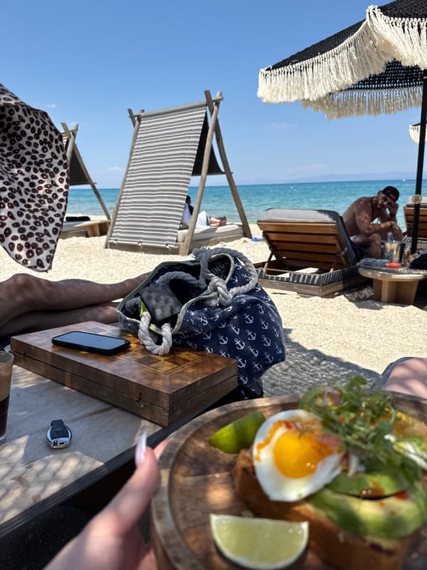 Beachside brunch and laptop time at a Greek beach club