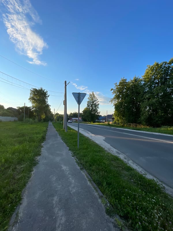 Six-minute afternoon walk documented through Russian village streets