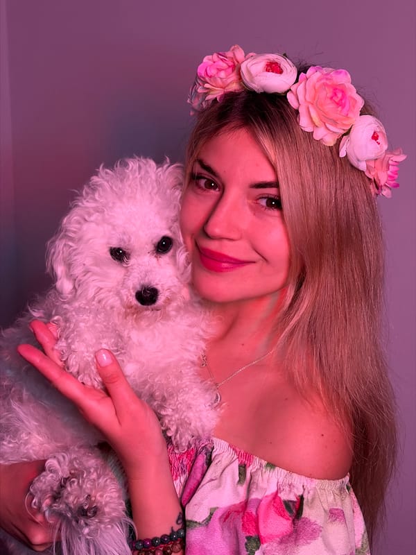 Woman cuts decorated cake in Budva kitchen