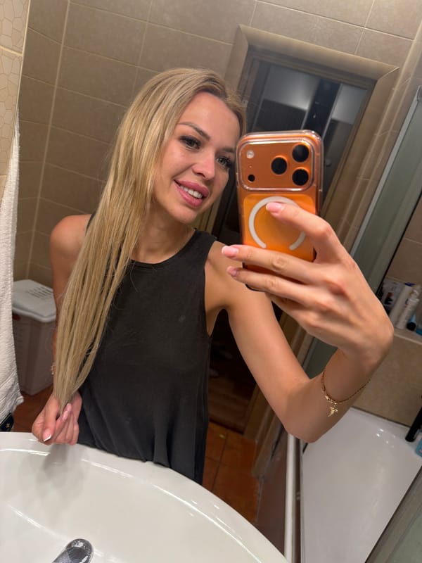 Bathroom selfies with a poodle, plus Kyiv at night