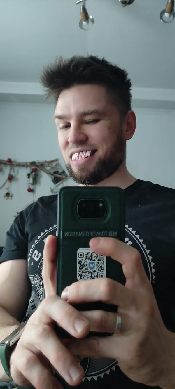 Man takes multiple selfies with props in Fryazino room