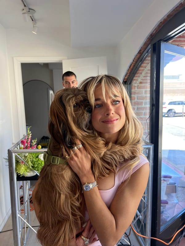 Everyday moments captured across San Diego: woman with dog, flower shop, DJ