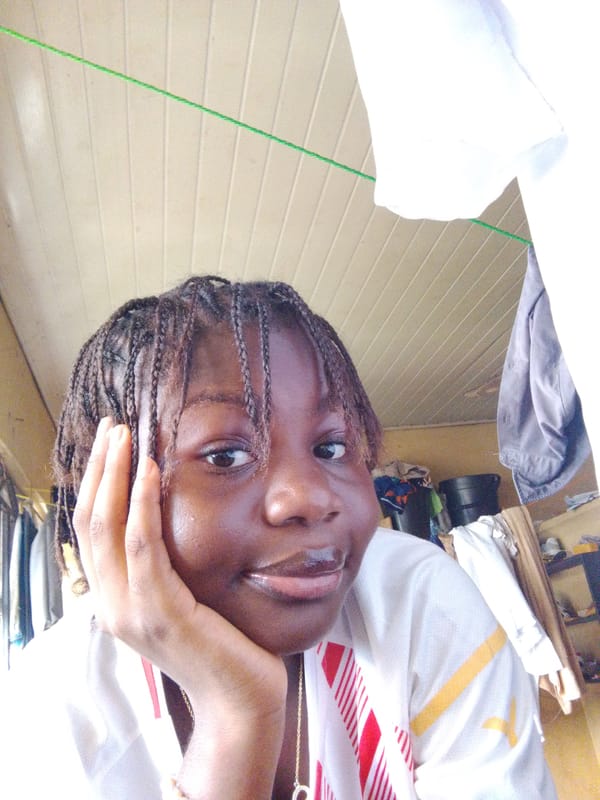 Young woman photographed in casual moments in Nsukka, Nigeria