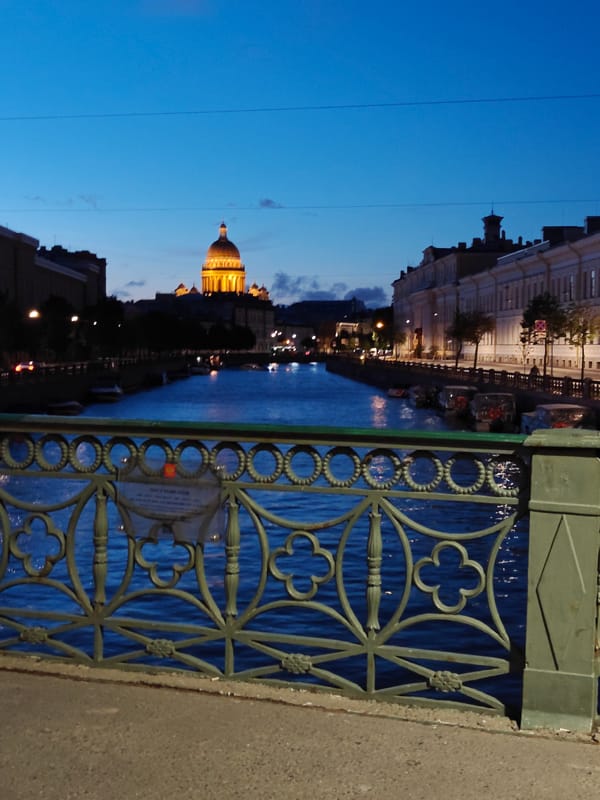Saint Petersburg at night — canals, traffic, and twilight blues