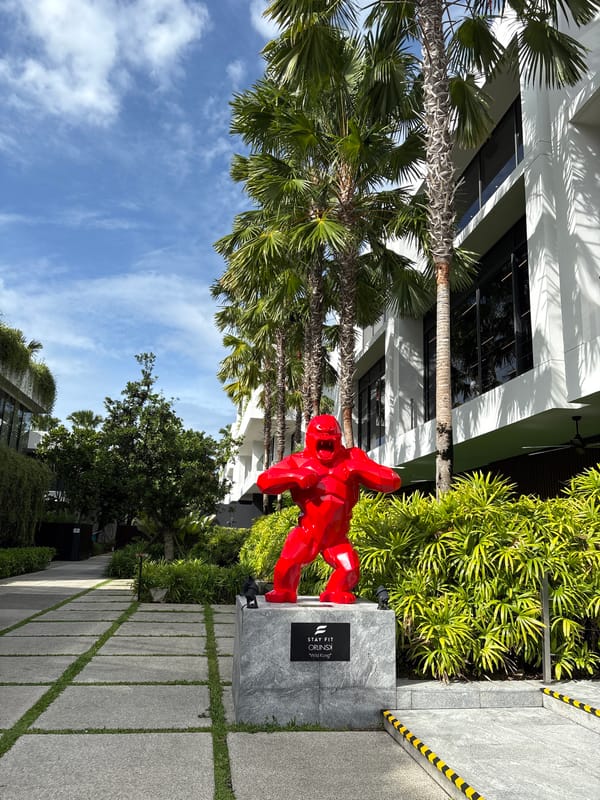 Red gorilla sculpture spotted on plinth in Rawai, Thailand