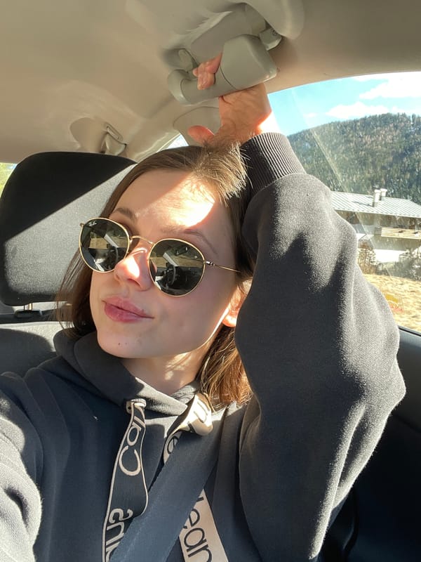 Woman in Calvin Klein hoodie spotted reclining in car