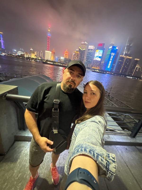 Shanghai skyline captured by tourists during foggy evening hours