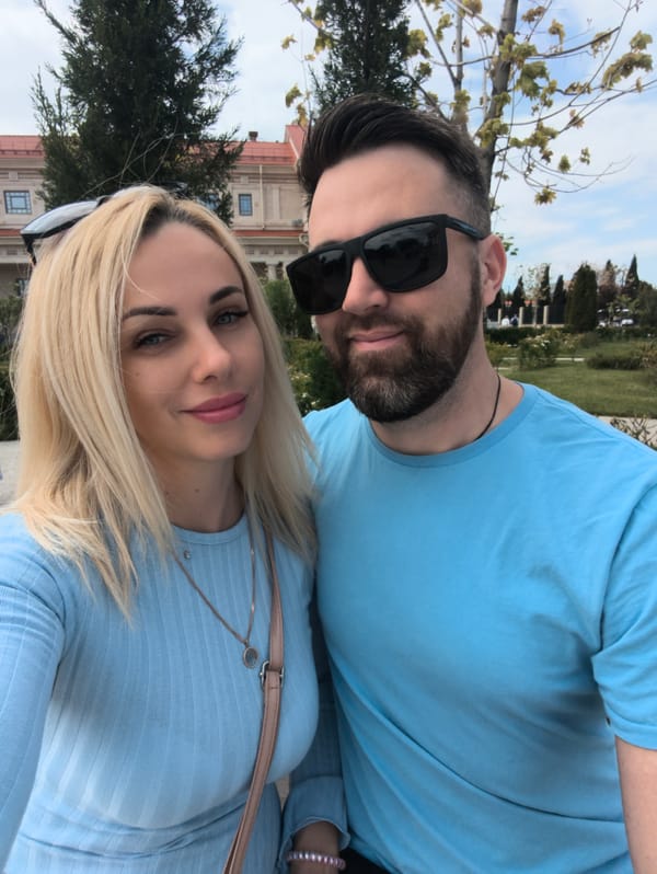 Couple takes selfies at Sevastopol Art Museum during street performance