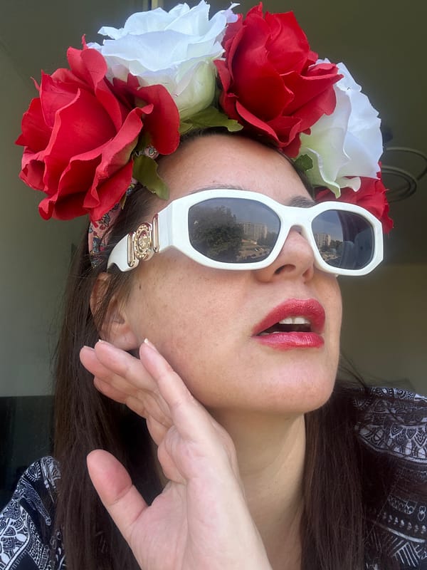 Floral headband and bold shades spotted in Riga