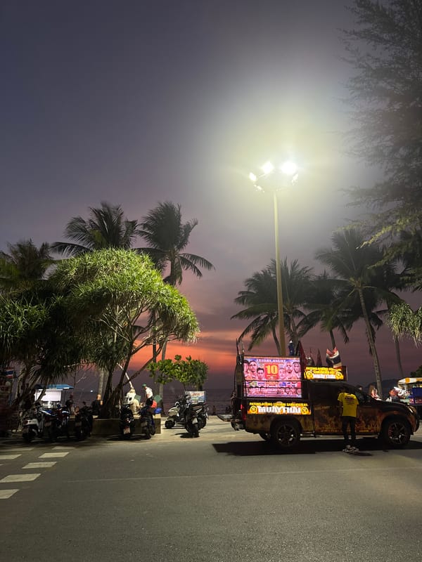 Woman takes selfies near wedding setup at Patong beach