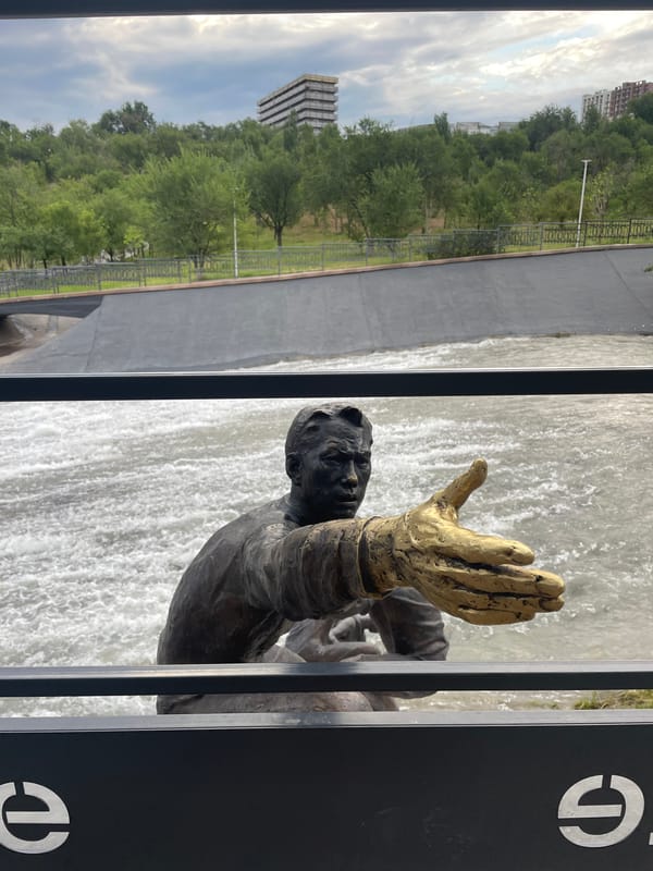 Almaty riverfront park: sculptures, spillways, and everyday foot traffic