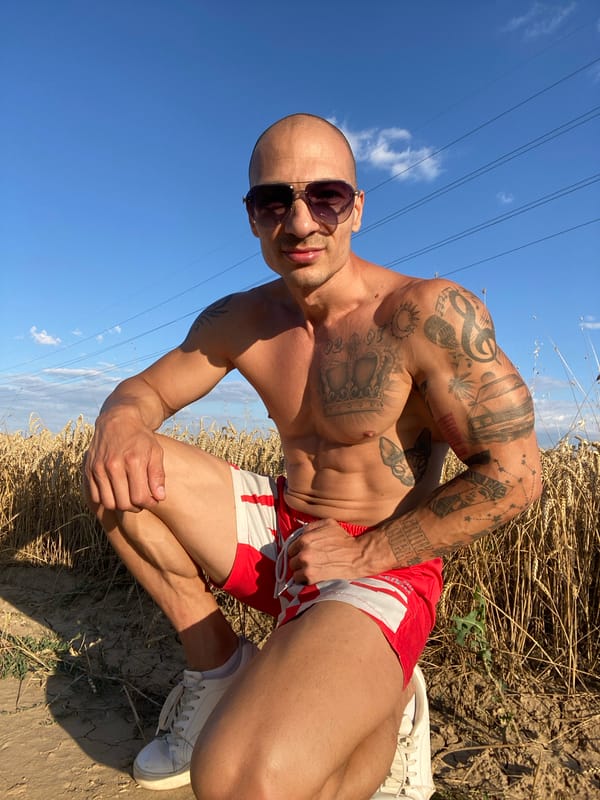 Goofing around in a Bulgarian wheat field with a dog nearby
