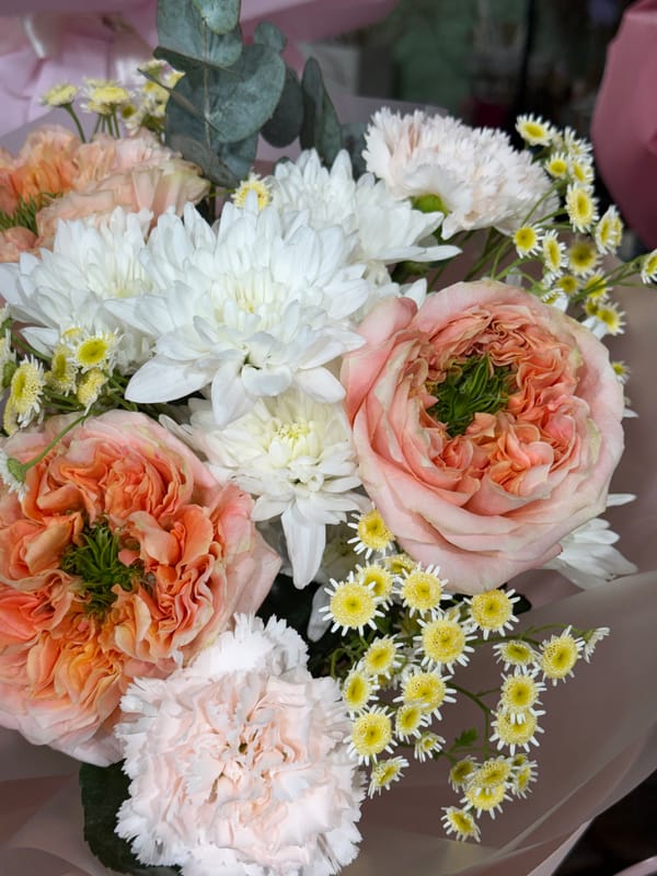 Flower shop visit with detailed bouquet photography and casual moments