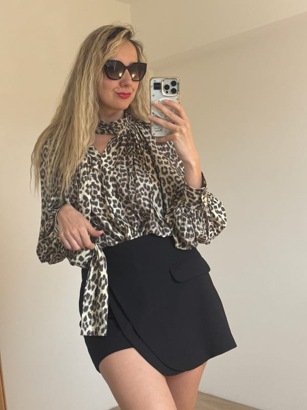 Woman takes selfies in leopard print outfit in Carnikava