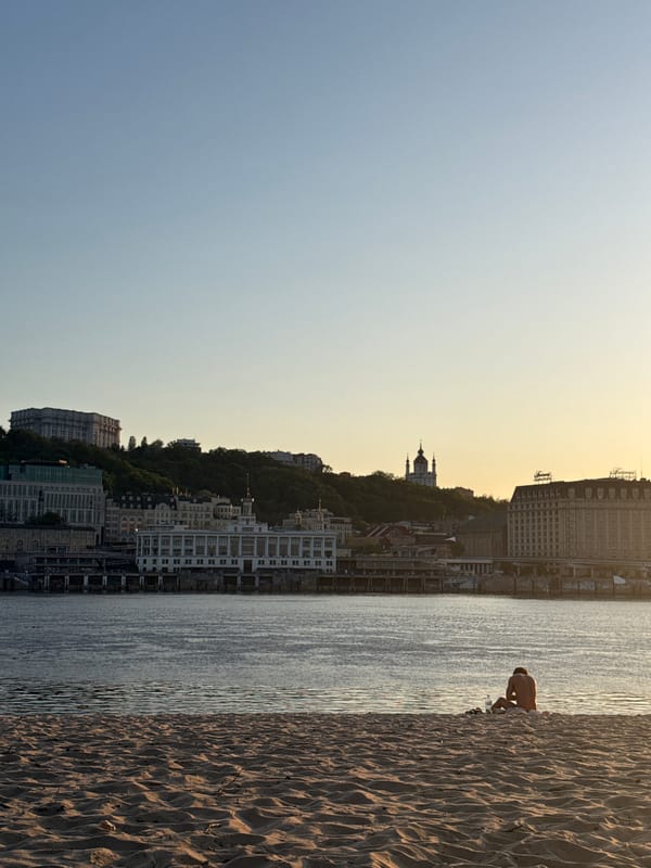 Evening beach leisure observed along Kyiv's Dnieper River