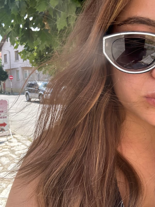 Close-up style shots: sunglasses, hair, and polka dot heels