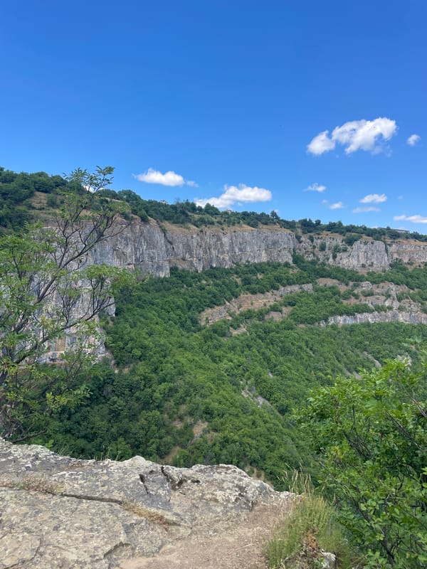 Rocky overlook views across forested valleys in Zasele, Bulgaria
