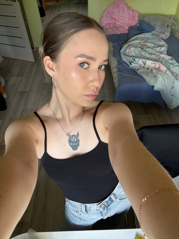 Woman photographed in casual indoor setting in Russia