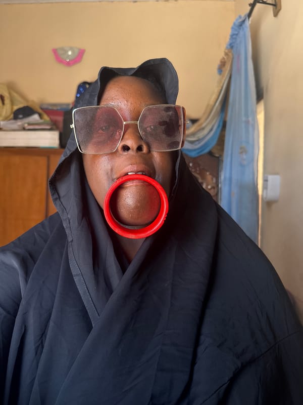 Woman in traditional dress photographed in Madangala, Nigeria