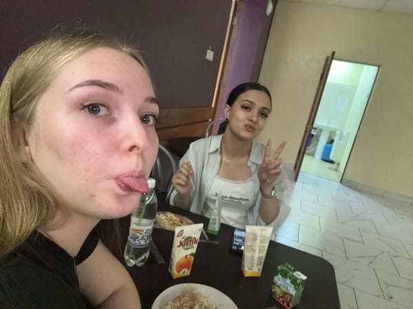 Two women share late night meal in Perm apartment