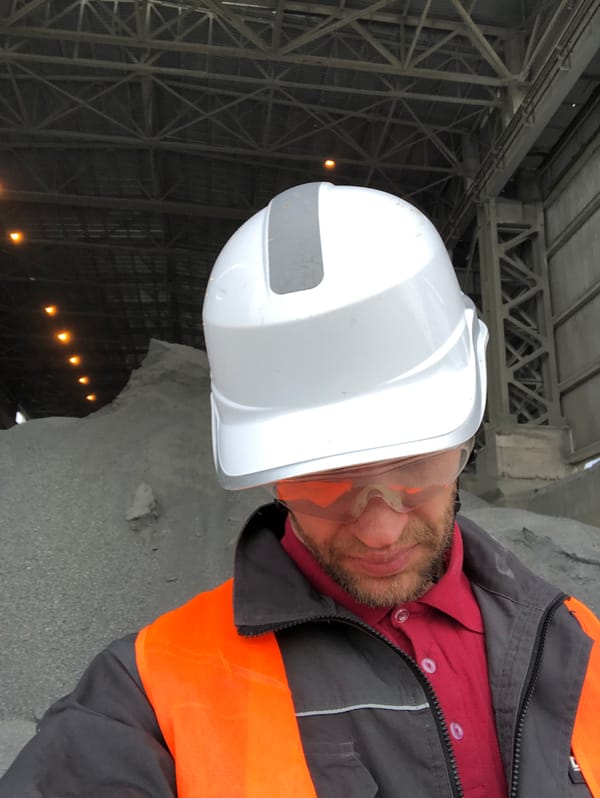 Worker documents routine operations at Slantsy industrial facility
