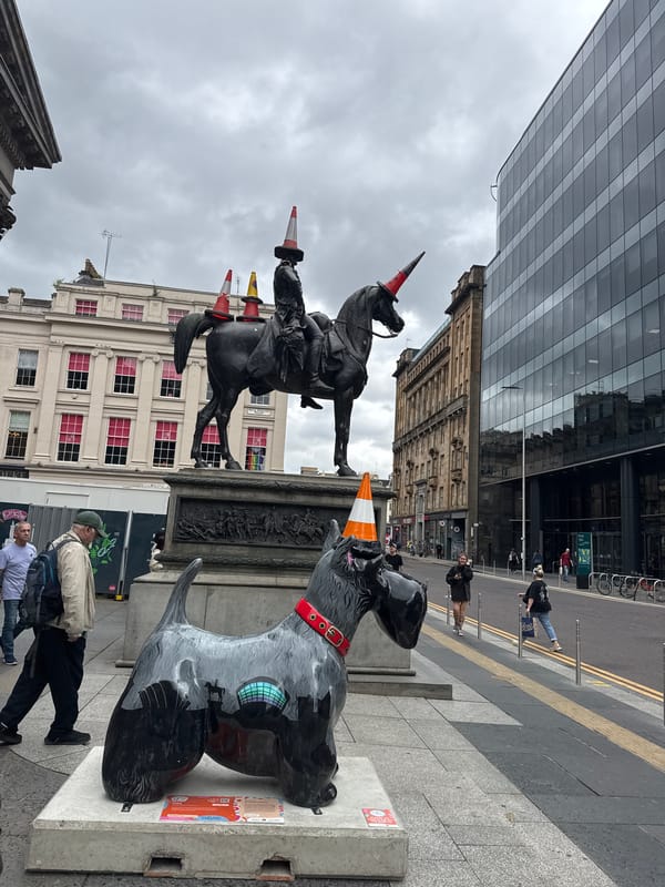 Glasgow's cone-topped statues doing their thing outside GoMA