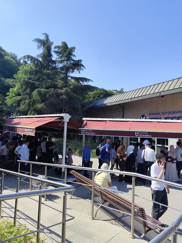 Crowds queue at Eyüpsultan metro station near mosque