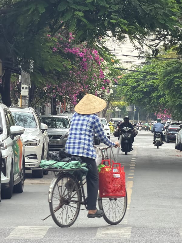 Rainy morning traffic on the streets of Nha Trang