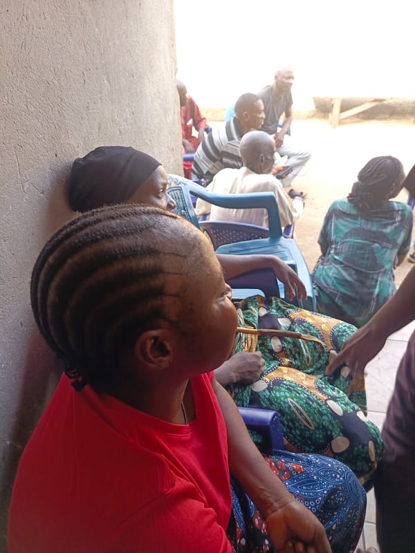 Community gathering observed in Akwanga, Nigeria outdoor setting