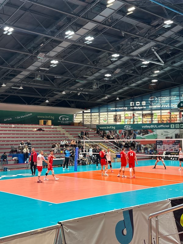 Indoor volleyball match observed at arena facility