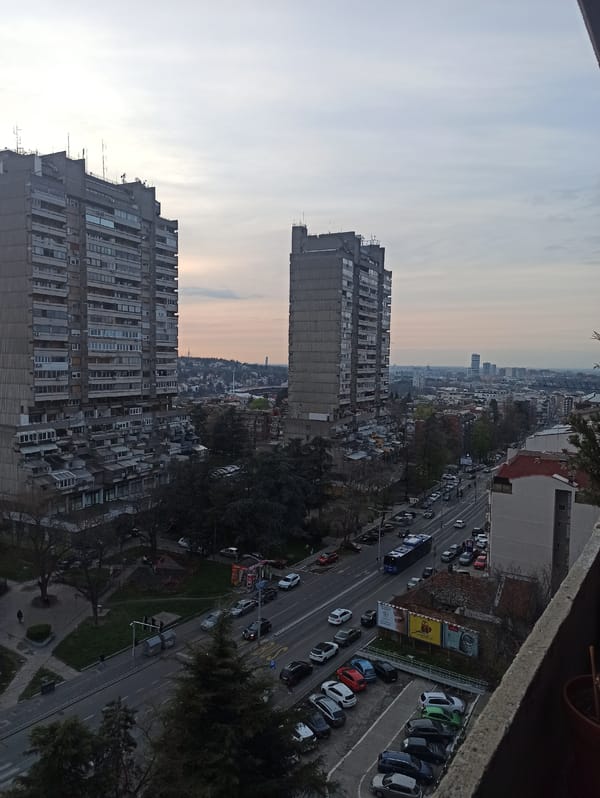 Sunset views of concrete apartment buildings in Belgrade captured