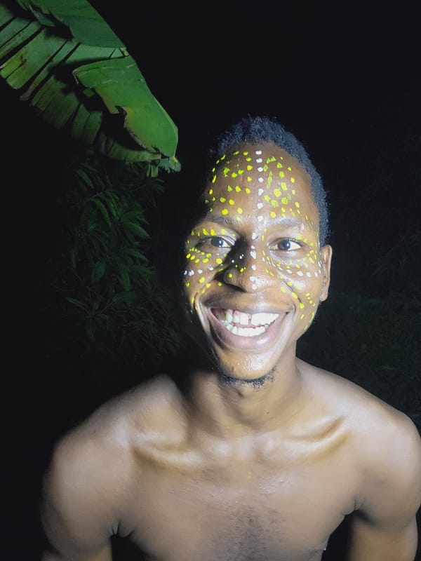 Man with traditional face paint photographed in Nkpor, Nigeria