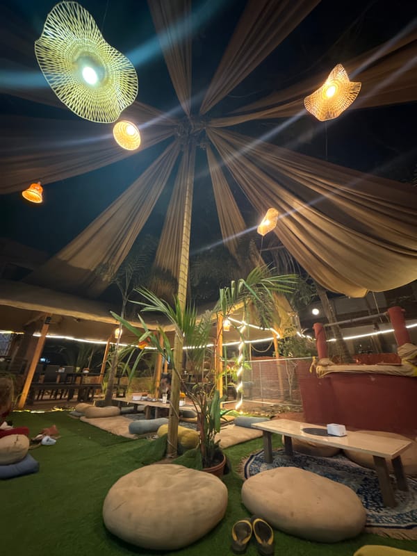 Tourist documents dining and street scenes in Arambol, Goa