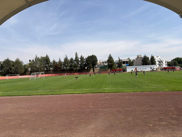 Everyday scenes captured in San Bernardino Tlaxcalancingo: soccer field, cafe