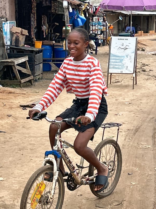 Daily street life along Ihiagwa's dusty roads