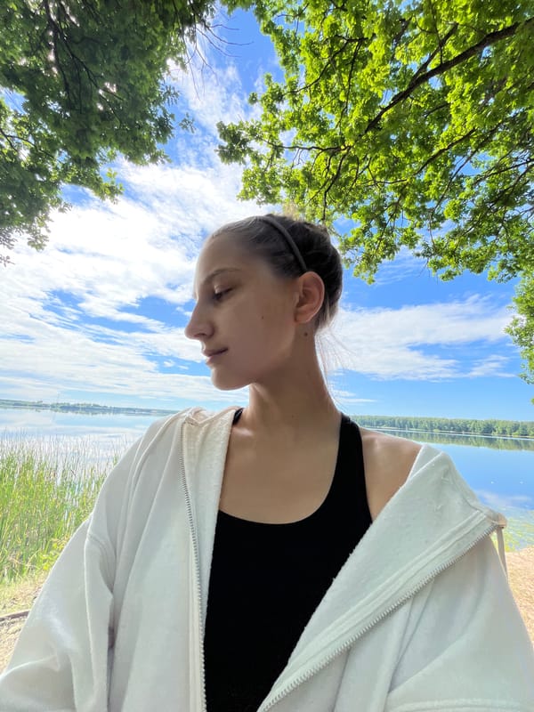 Quiet lakeside pause in rural Belarus, summer morning