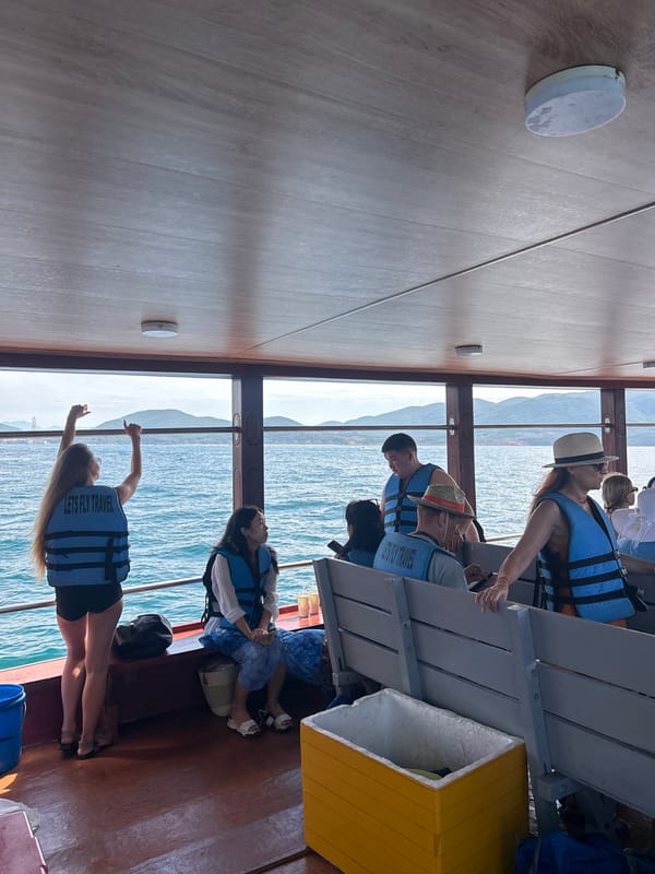 Tour boat cruising Nha Trang's calm coastal waters