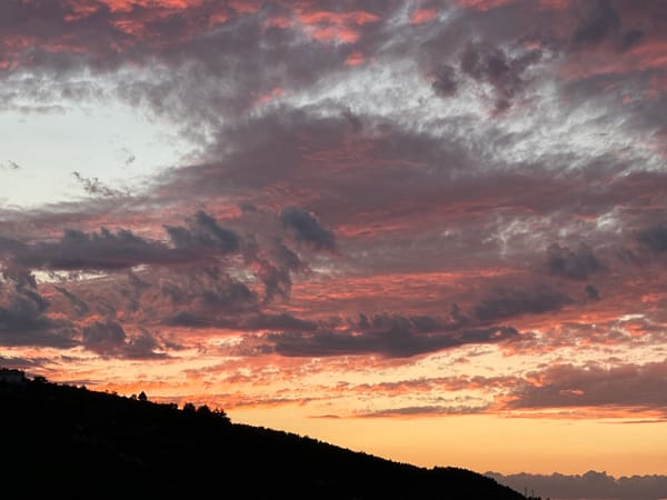 Colorful sunset lights up the sky over Asenovgrad, Bulgaria