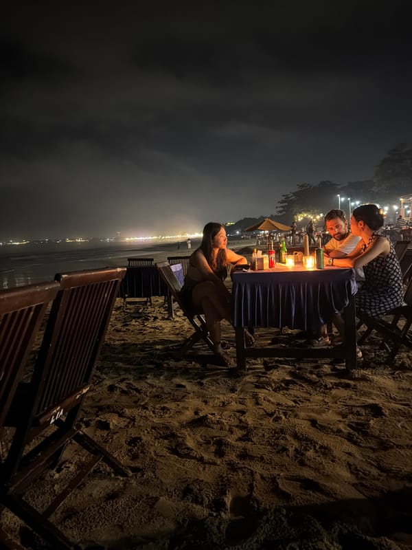 Evening beach dining with candles and music in Kuta Selatan