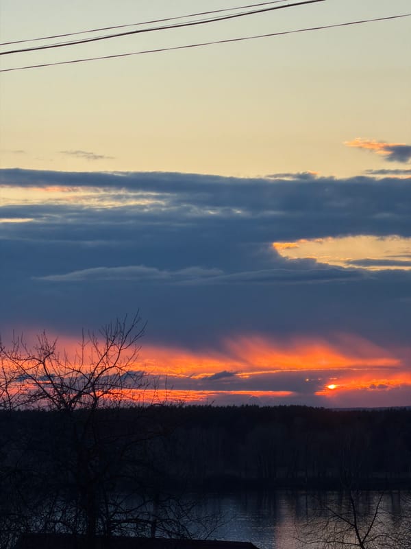 Dramatic sunset witnessed over Chaikovsky, Russia waterways and neighborhoods