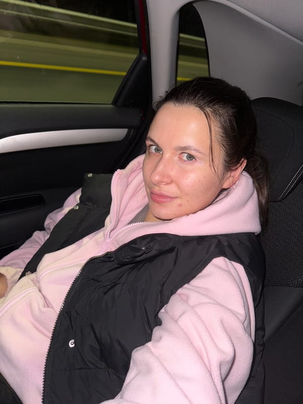 Woman in pink hoodie observed in car in Spirino