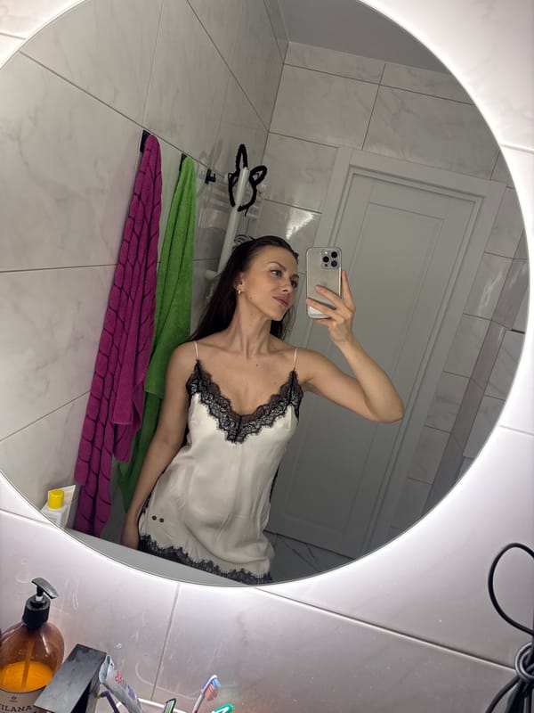 Woman takes bathroom selfies in Murino, Russia