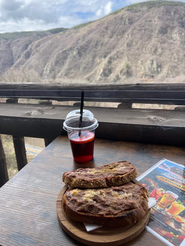 Morning refreshments with mountain views in Kovachevitsa, Bulgaria