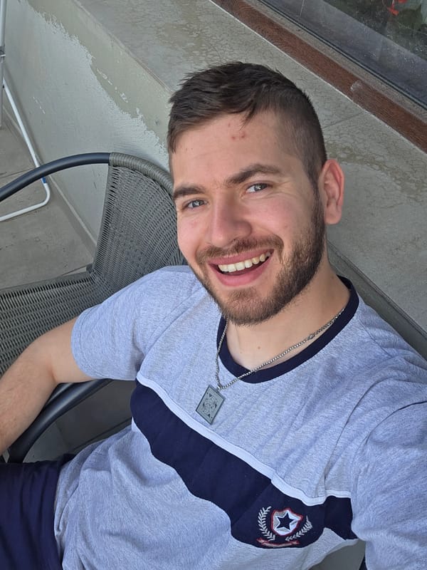 Man takes morning selfies on balcony in Bulgarian village