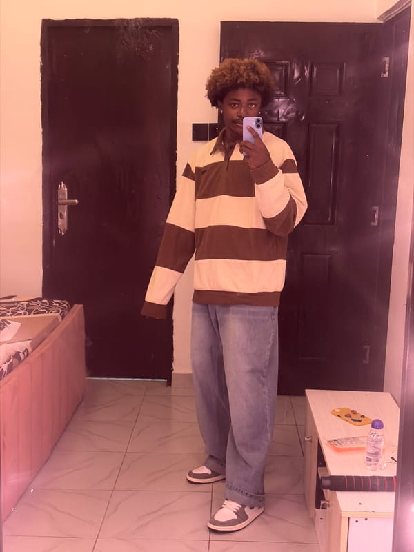 Man takes mirror selfie in Igboefon, Nigeria