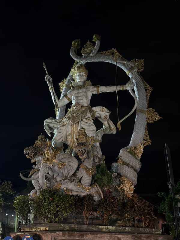 Evening scenes captured around illuminated temples and food stalls in Ubud