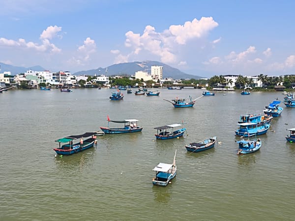 Nha Trang's riverfront and Cham Towers on a busy morning
