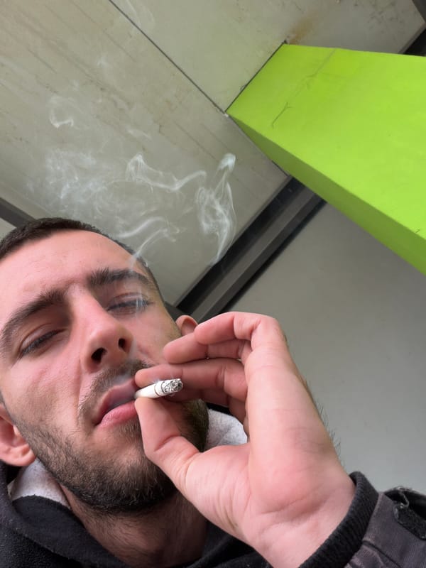 Man photographed smoking cigarette in Bulgarian village