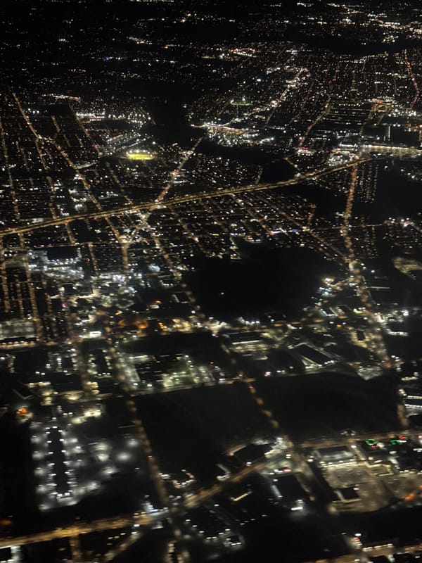 Aerial night view captures illuminated Pennsylvania townships from above