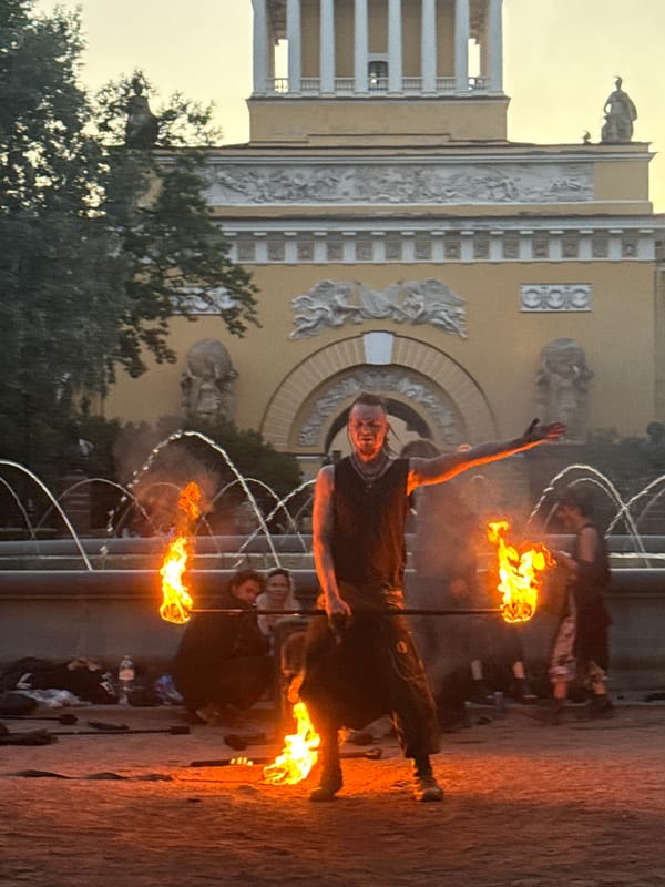 Fire performance lights up Palace Square on a June evening